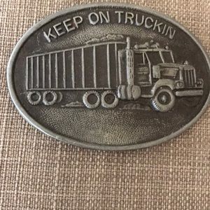Keep on trucking belt buckle